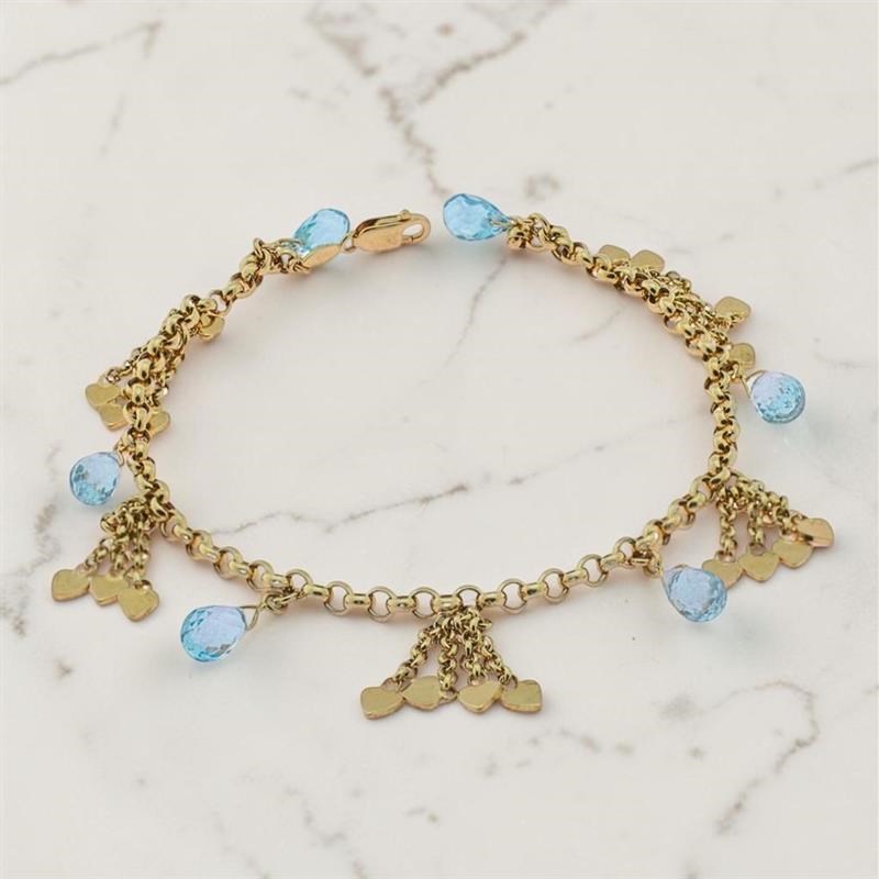 Bracciale donna in oro giallo con charm a cuore e topazio: Eleganza senza tempo